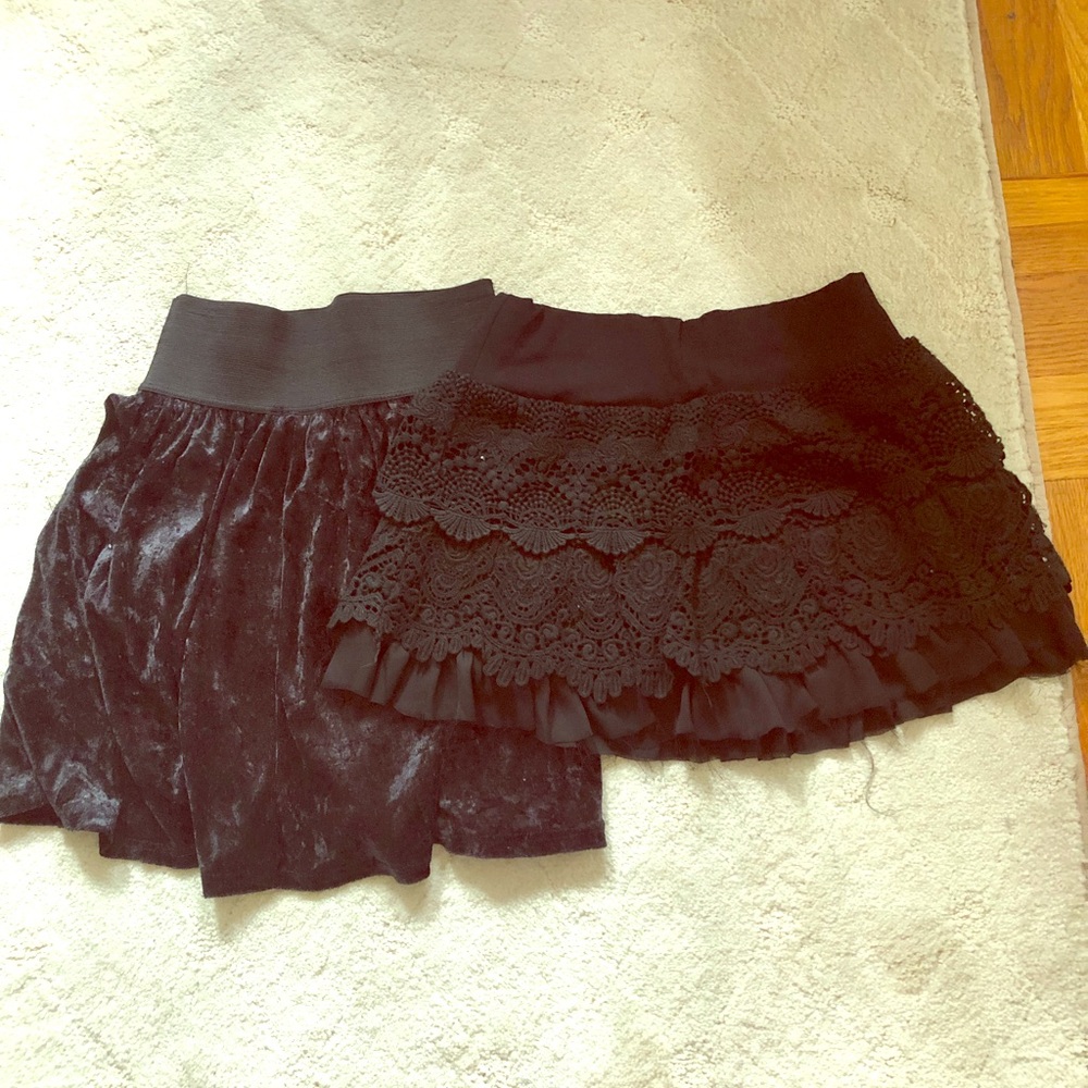 2 black skirts ( lace print) size small